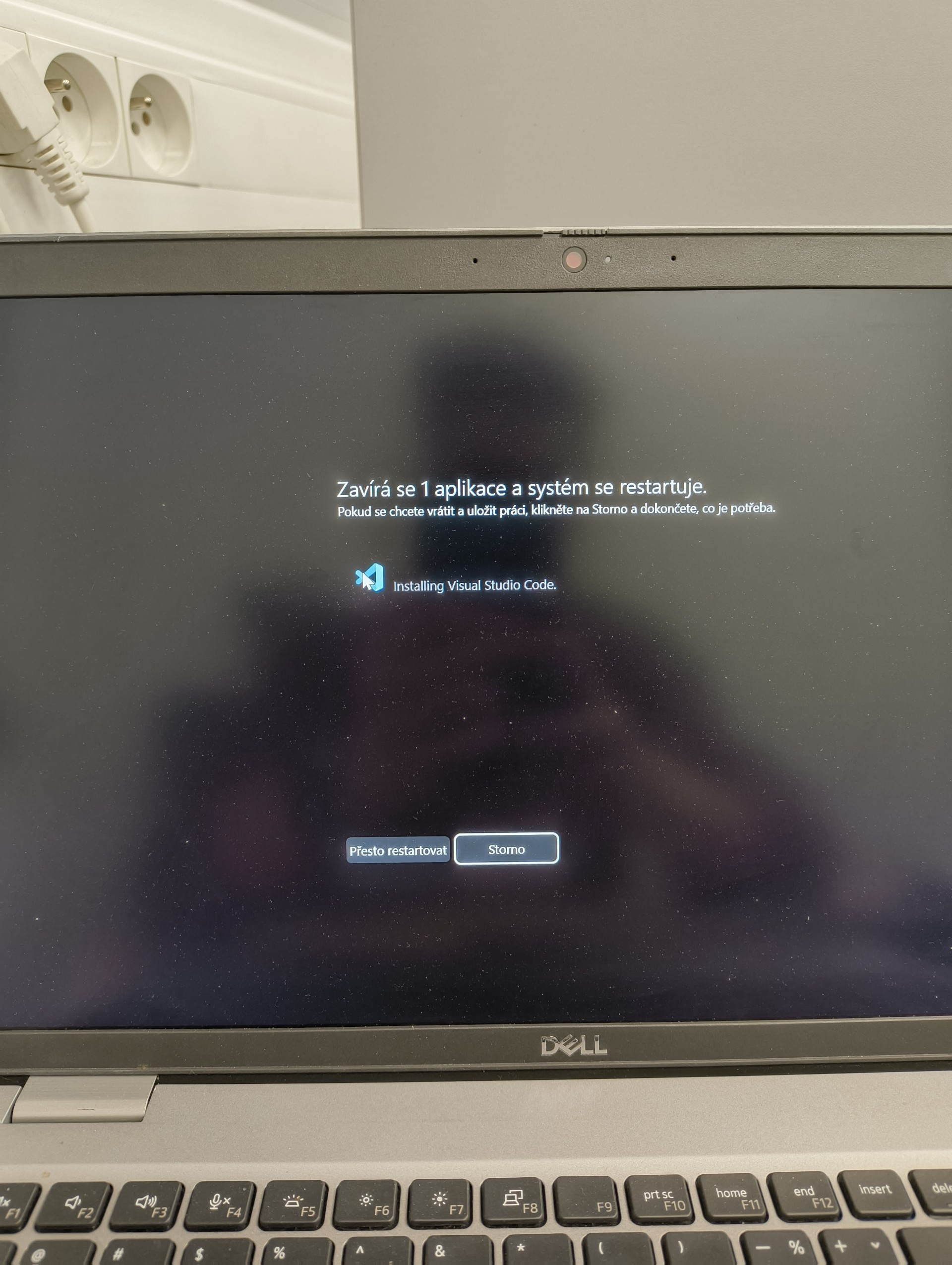 Hold on, we need to install VS Code before you can restart.